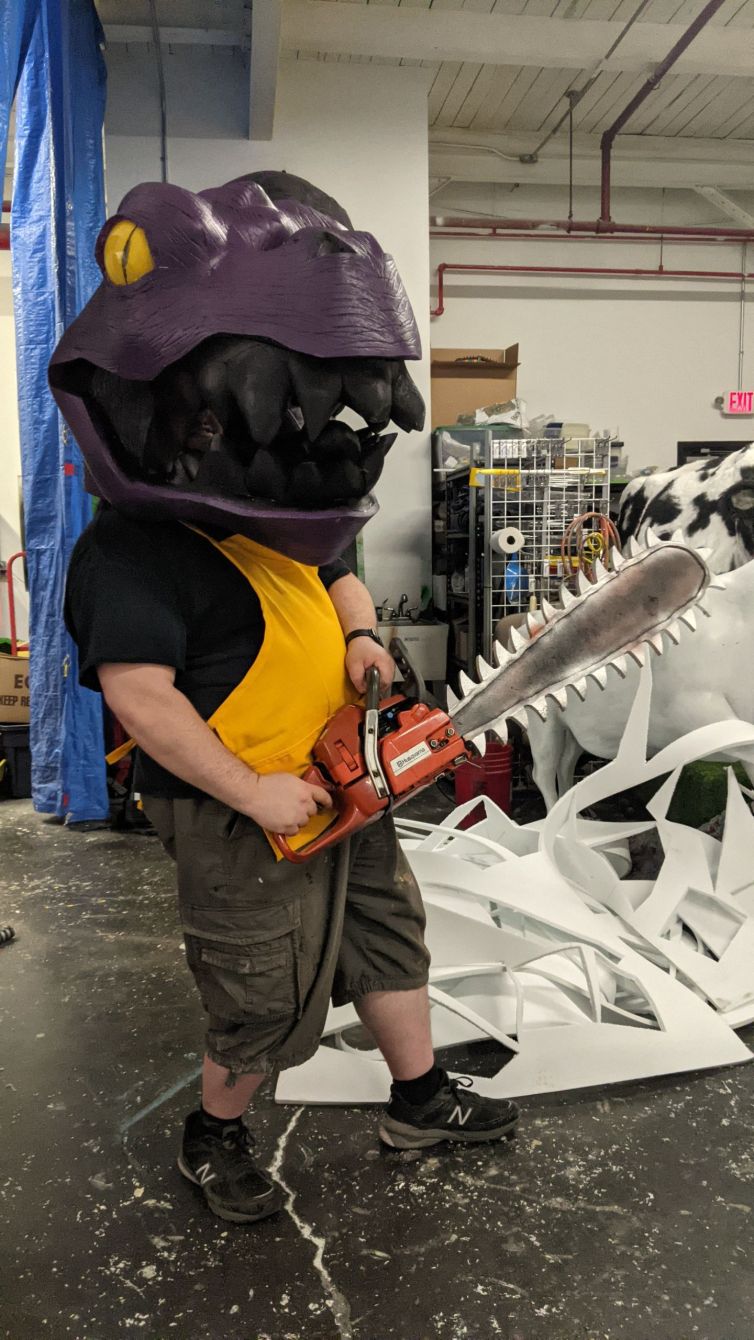 T-Rex head, and customized chainsaw prop test fit