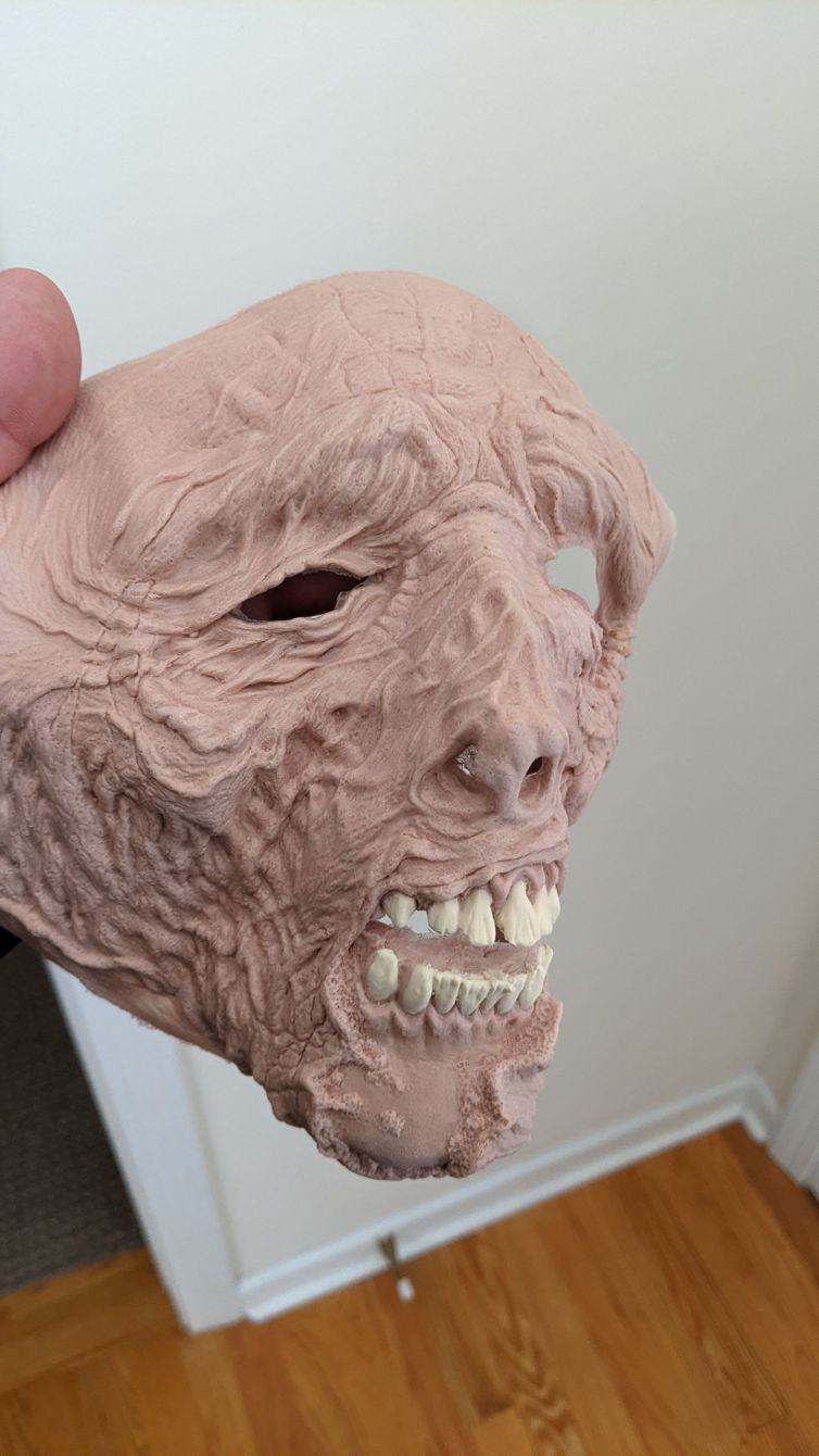 Rotting old Thuppan Thamburan face prosthetic