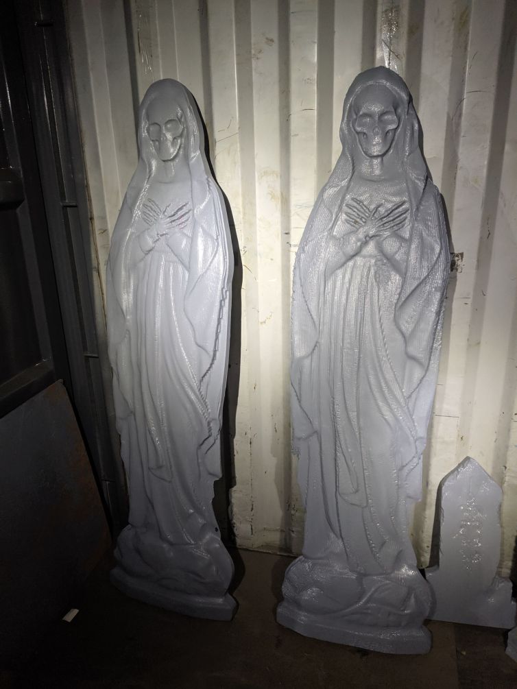 Carved and hard-coated skeleton Mary statues