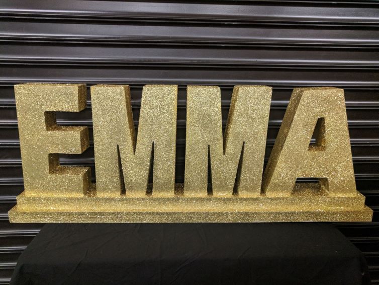 Gold glitter name display for mitzvah