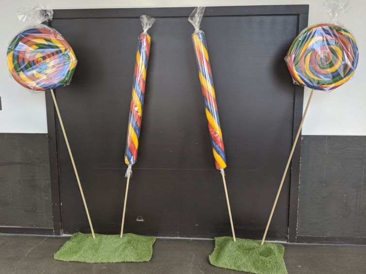 Cellophane wrapped giant rainbow swirl lollipops