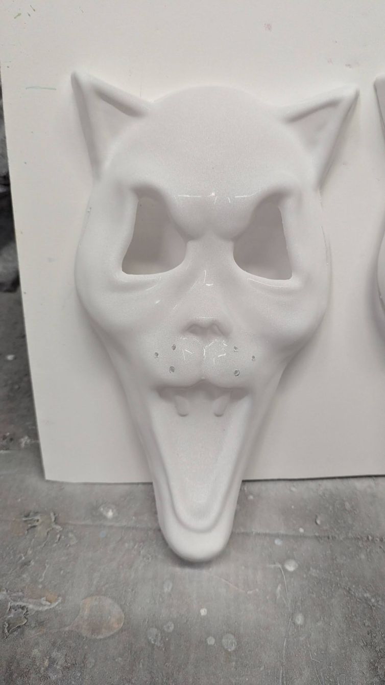 White coated vacuform mask