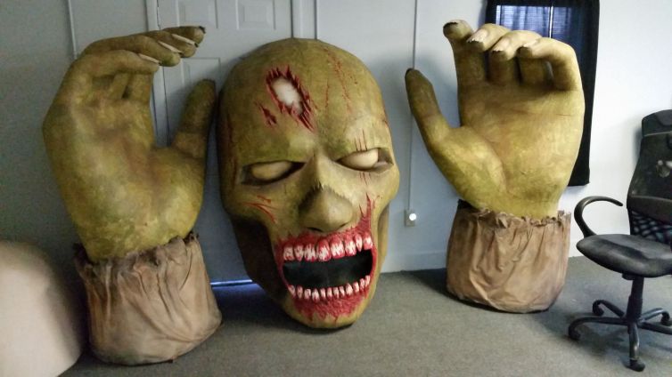 Giant zombie head and hands combo