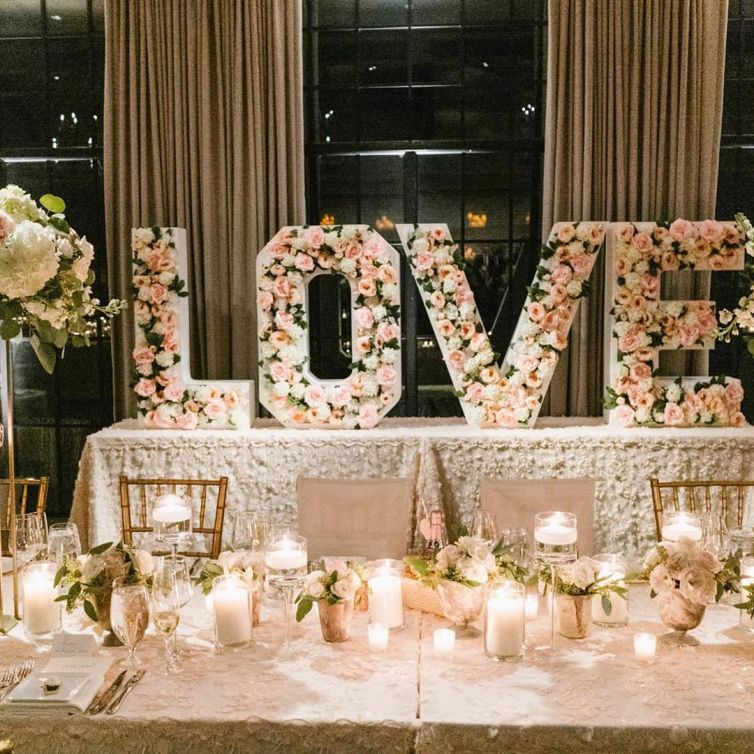 Flower filled LOVE display at wedding