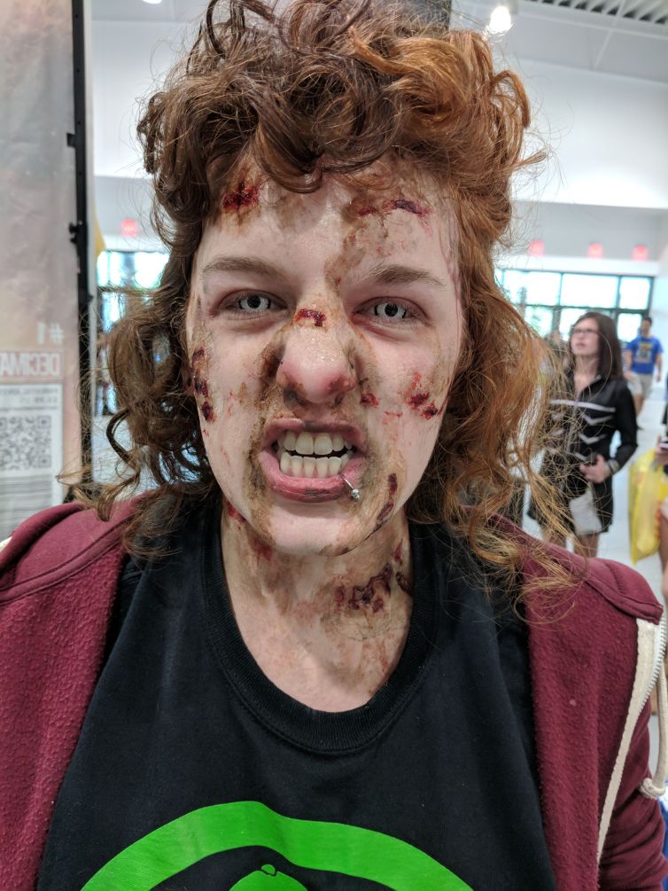 Diseased zombie makeup booth assistant at TerrifiCon