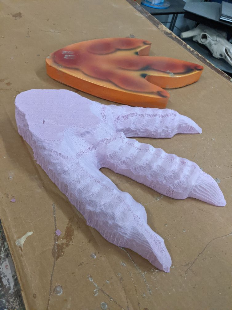 CNC cut of dinosaur foot for mini golf course