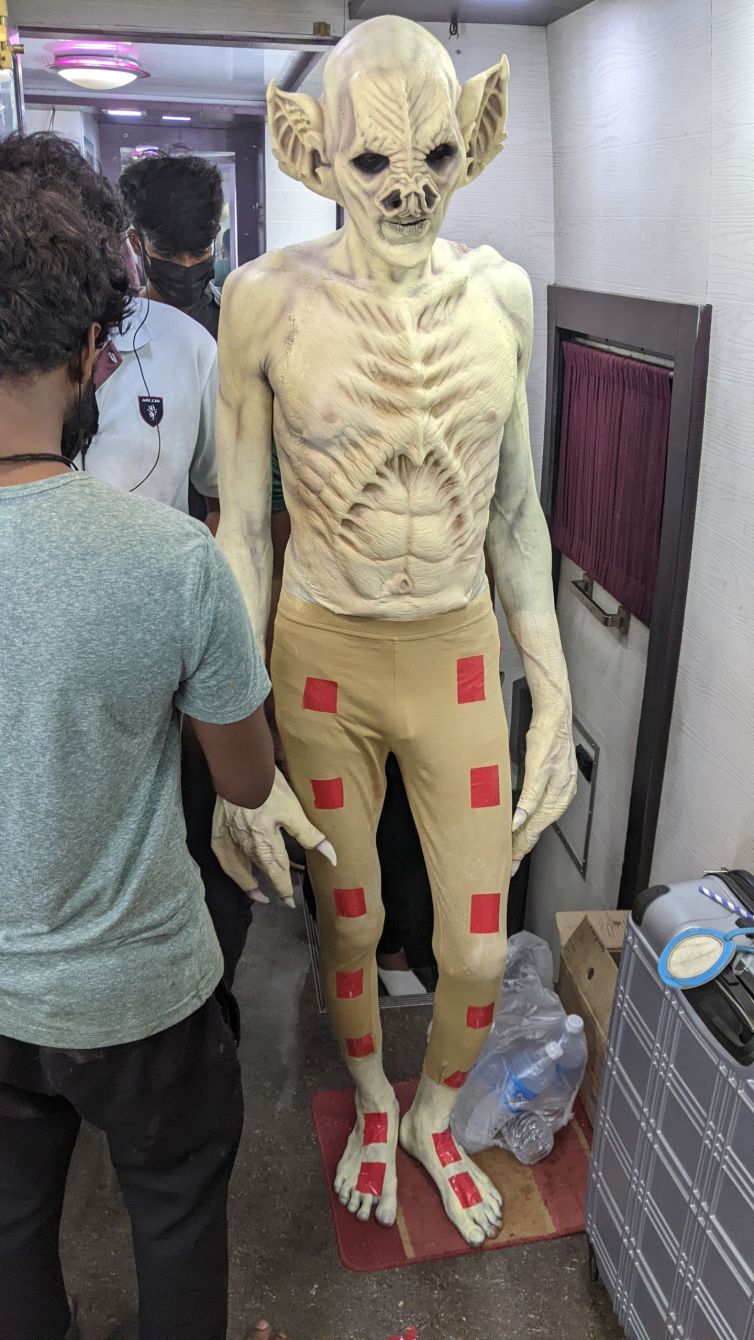 Gari Devan makeup full body with CGI markers on legs