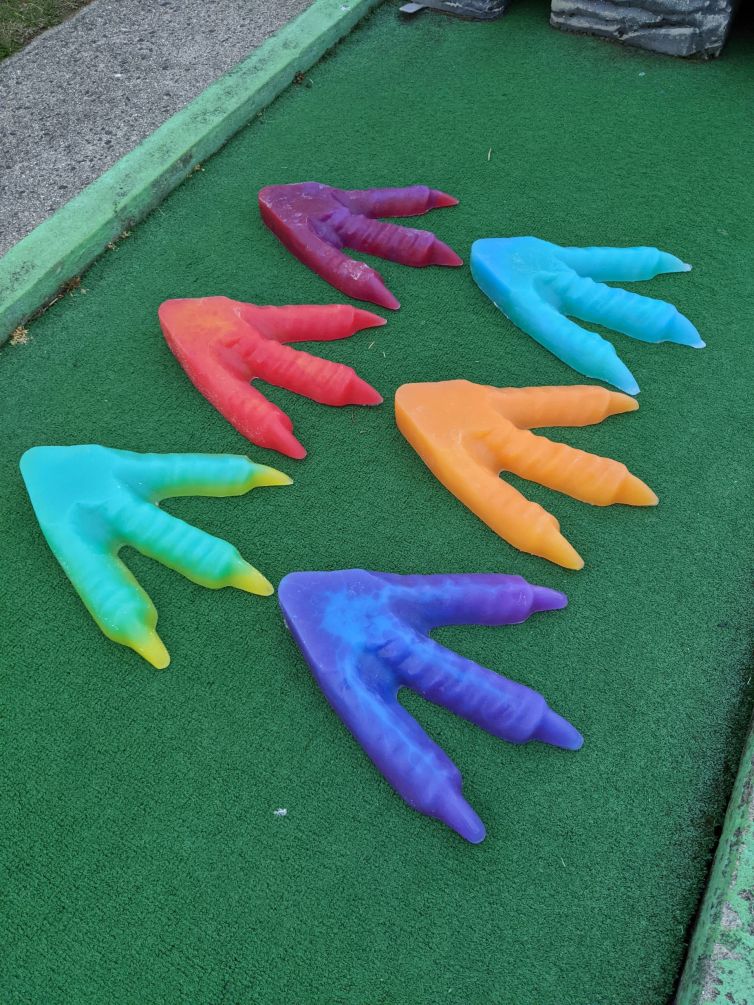 Set of dinosaur foot resin casts for mini golf course