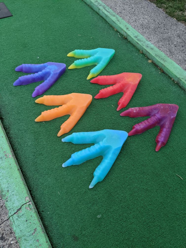 Set of dinosaur foot resin casts for mini golf course