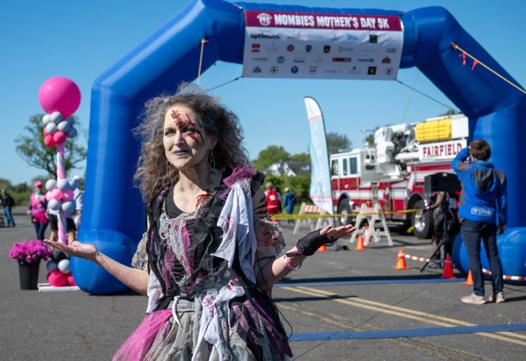 MOMbies founder Terry Davis in full prosthetic zombie makeup at MOMbies Mother's day 5K charity run