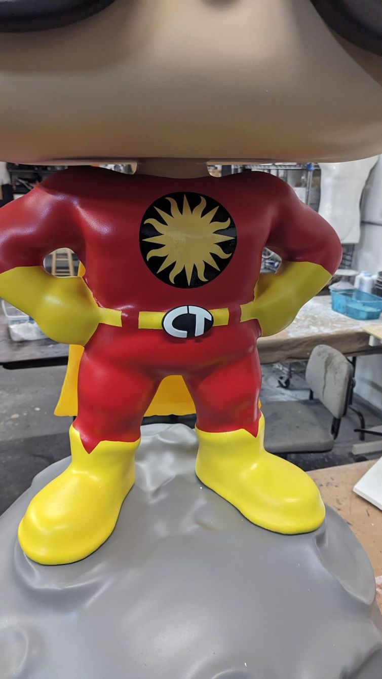 Finished 3D printed belt buckle on Captain TerrifiCon Funko Pop style photo-op statue