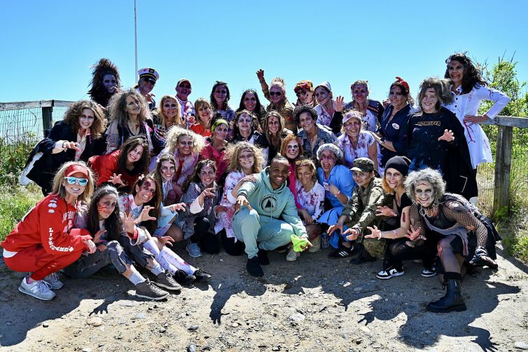 MOMbie group photo with lots of bloody lady zombies on Fairfield beach with Paul Herman of Press Play Events