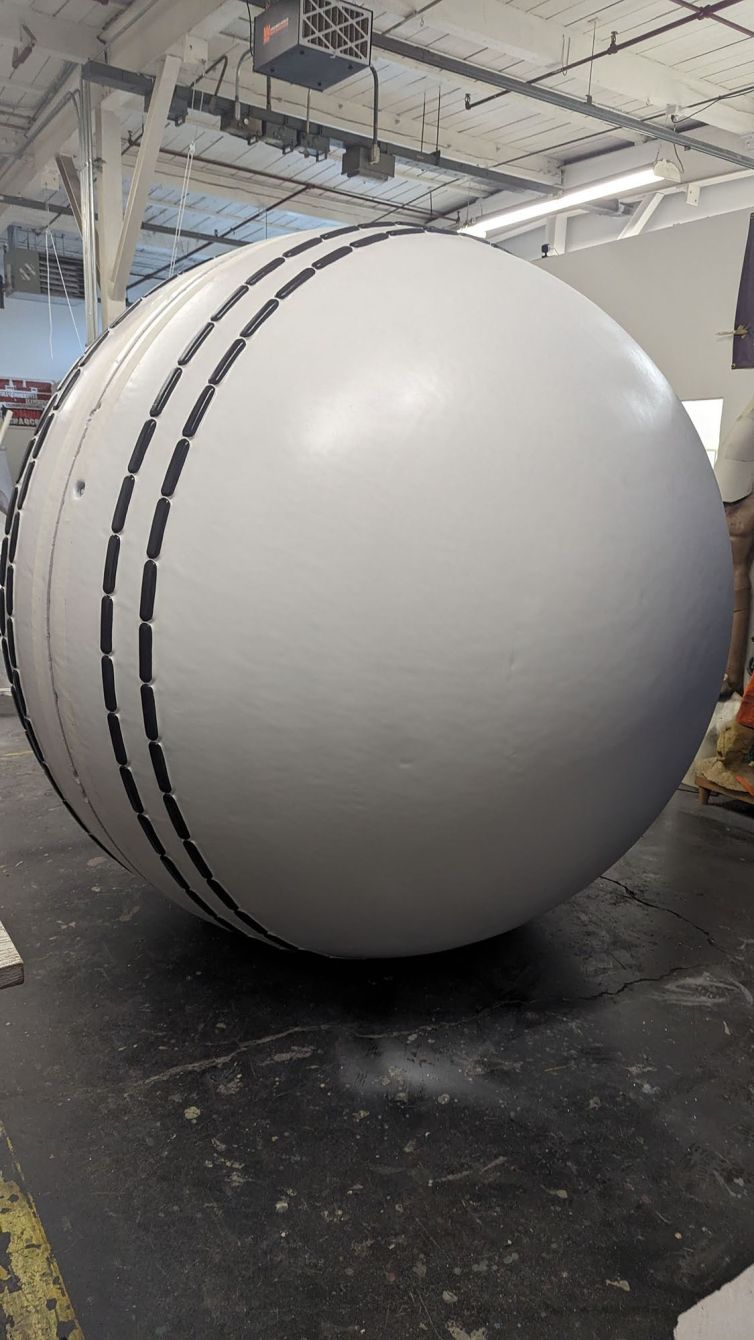 Test fitting the giant cricket balls together