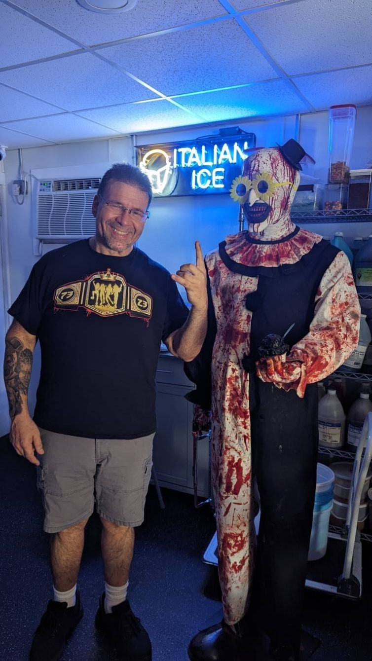 Photo-op of Art the Clown display with Micalizzi's Italian Ice owner Jay Piccirillo